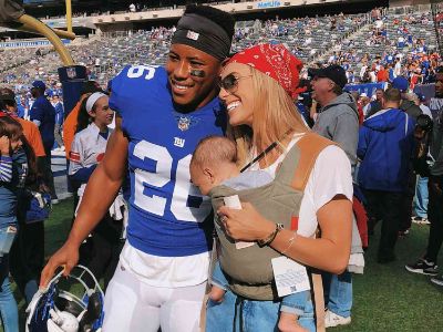 In the frame Saquon Barkley with his wife Anna Congdon and daughter Jada Barkley.
